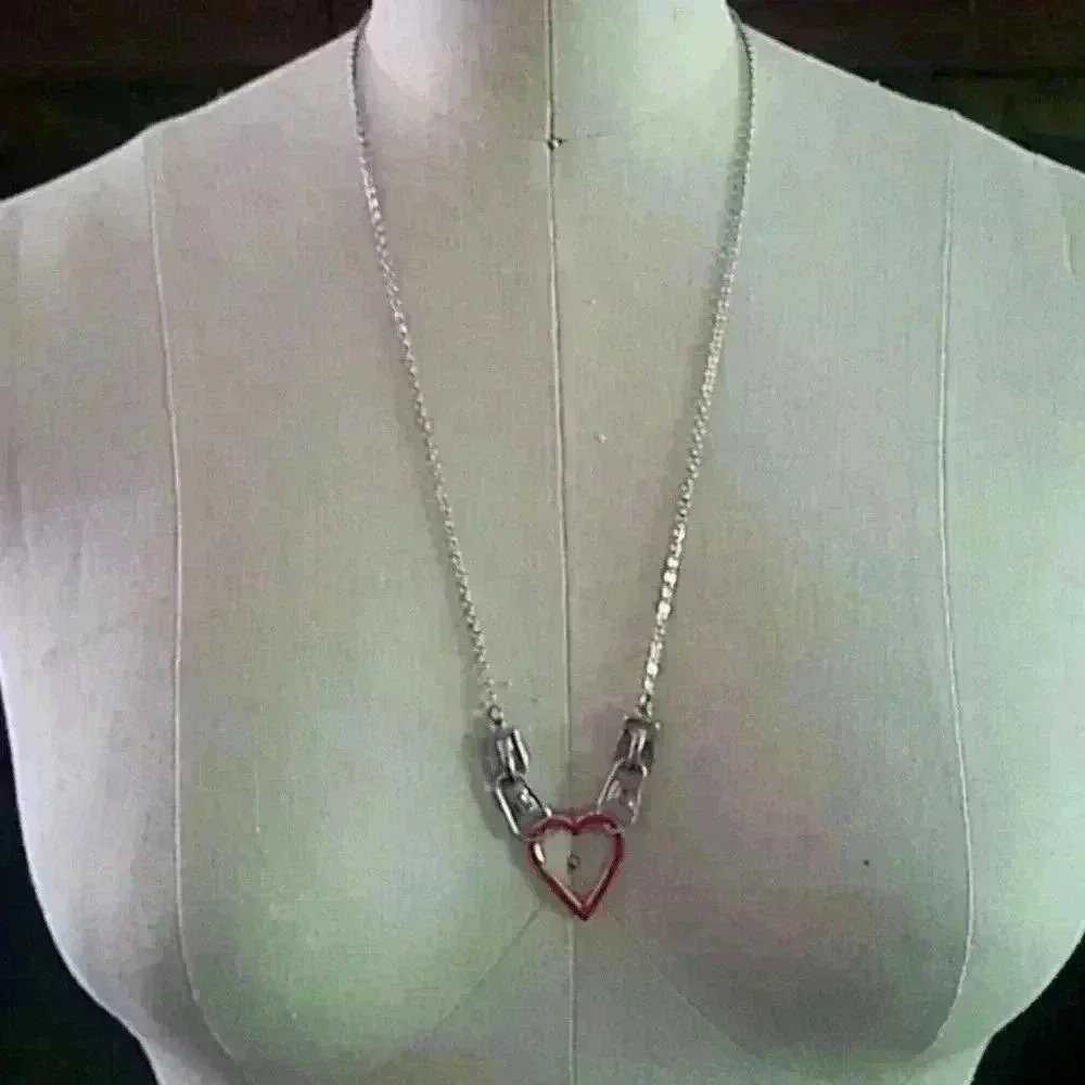 2/$4 bundle to save Zipper heart necklace.